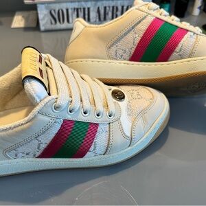 Gucci Authentic with papers,Originally paid $1200. Brand new worn twice.